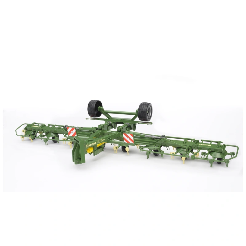 Hilerador Krone desplegado en posición de trabajo Hilerador Krone verde completamente desplegado con varios rotores y las ruedas de transporte elevadas.