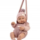 Muñeca Recién Nacida Nica suspendida en el Portabebé de Antonio Juan, de 42 cm, con cuerpo de vinilo sexuado y tacto especial.