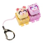 Dos personajes Clickeez Pack Doble Serie 3 de Bizak en tonos naranja y rosa con llavero.